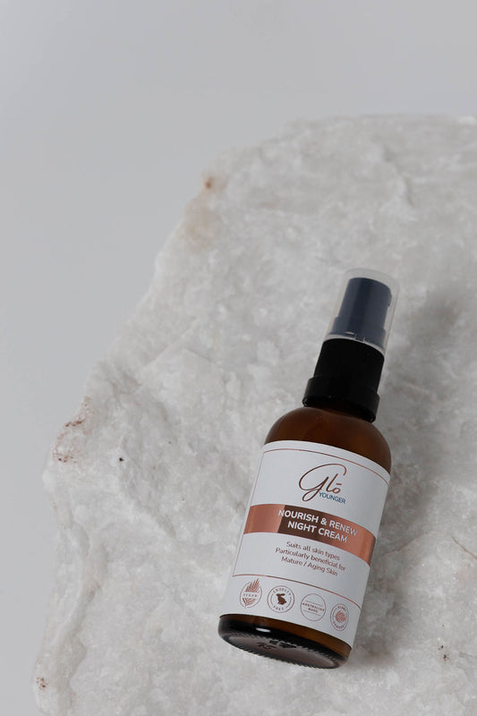 Glo Younger Nourish and Renew Night Cream jar on stone