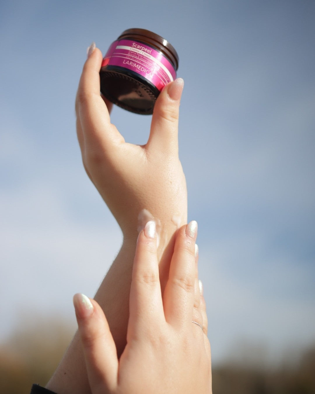 Larimedical Scarpeel Cream being applied to skin